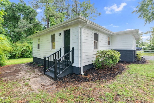 313 W Church St, Angier, NC 27501 - view of property exterior featuring entry steps