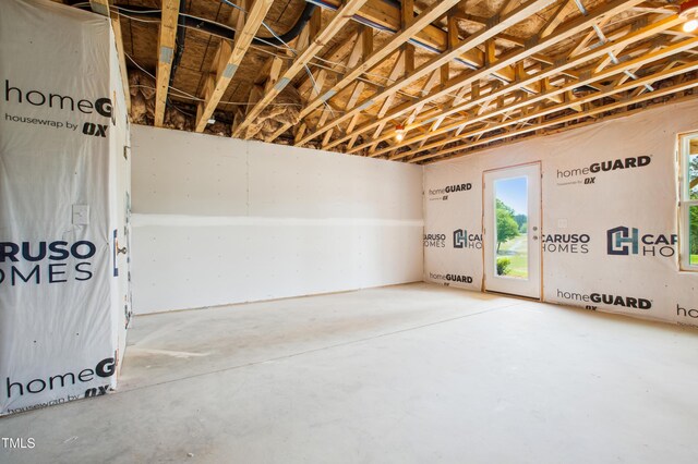 basement featuring plenty of natural light