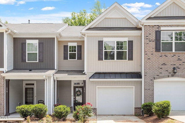 174 Walking Path Pl, Hillsborough, NC 27278 - multi unit property with an attached garage, brick siding, board and batten siding, a shingled roof, and concrete driveway