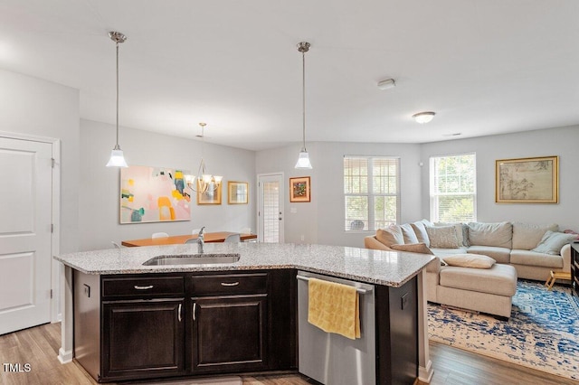 174 Walking Path Pl, Hillsborough, NC 27278 - kitchen featuring a sink, dishwasher, a chandelier, open floor plan, and light wood-type flooring