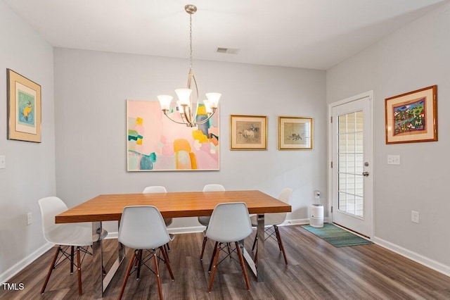 174 Walking Path Pl, Hillsborough, NC 27278 - dining space featuring wood finished floors, a chandelier, and baseboards