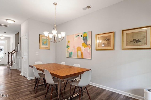 174 Walking Path Pl, Hillsborough, NC 27278 - dining space with a chandelier, dark wood-style flooring, baseboards, and stairway
