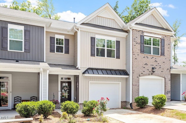 174 Walking Path Pl, Hillsborough, NC 27278 - view of property featuring a garage, brick siding, board and batten siding, driveway, and a shingled roof