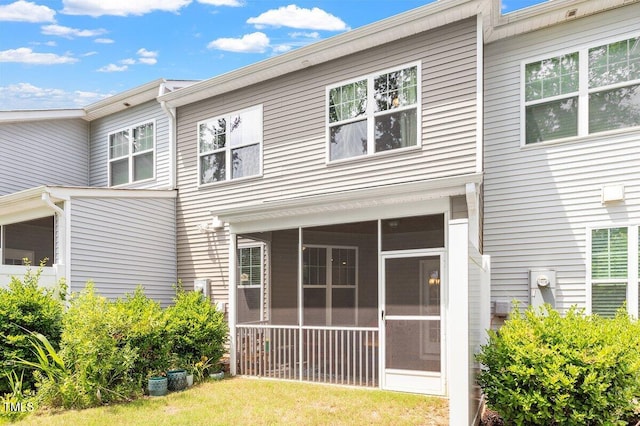 174 Walking Path Pl, Hillsborough, NC 27278 - back of house with a sunroom and a lawn