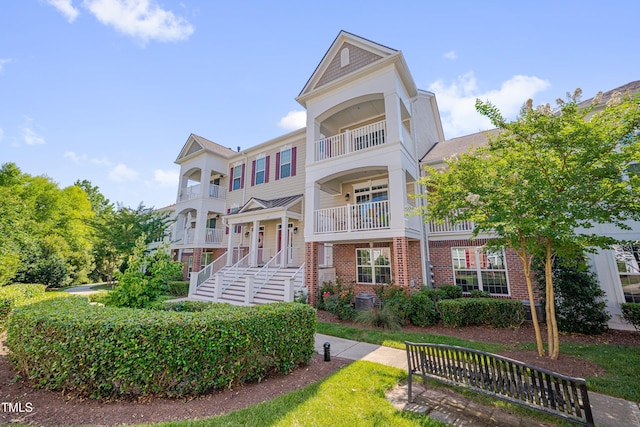 10330 Sablewood Dr Unit 104, Raleigh, NC 27617 - view of front facade with brick siding