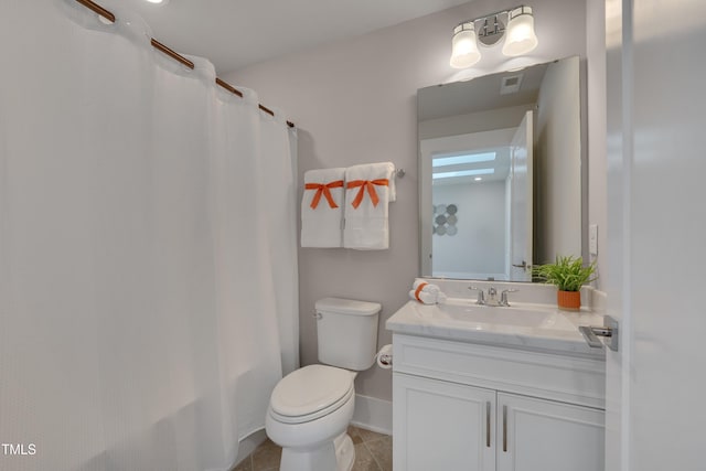 10330 Sablewood Dr Unit 104, Raleigh, NC 27617 - bathroom featuring vanity, shower / bath combo with shower curtain, and tile patterned flooring