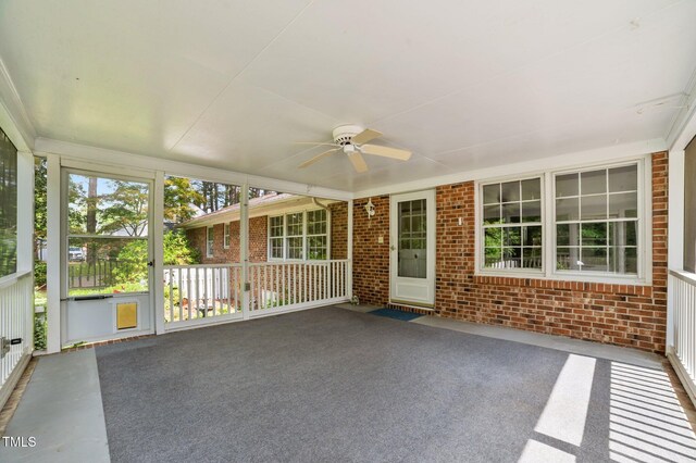 2610 N Main St, Tarboro, NC 27886 - unfurnished sunroom featuring a ceiling fan