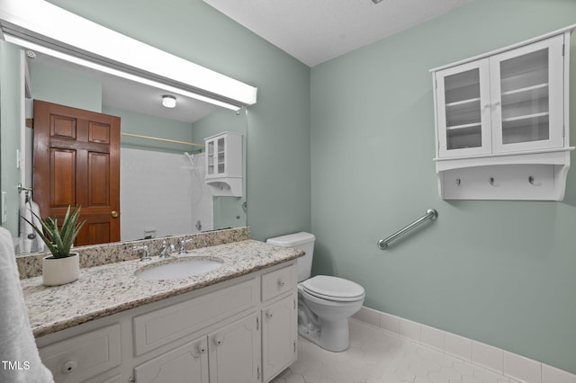 2610 N Main St, Tarboro, NC 27886 - bathroom with a shower with curtain, toilet, tile patterned floors, and vanity