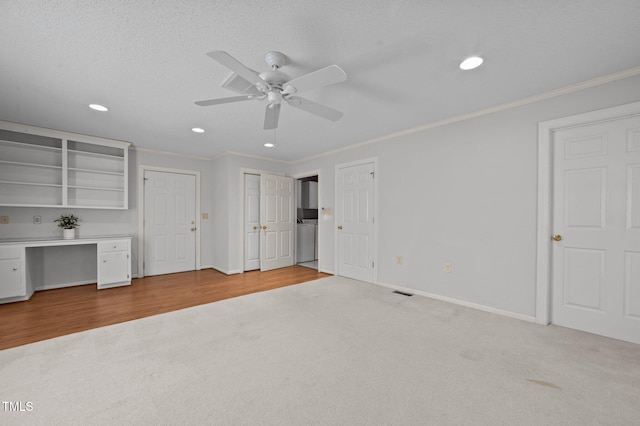 2610 N Main St, Tarboro, NC 27886 - unfurnished bedroom with carpet floors, ornamental molding, washer / dryer, baseboards, and recessed lighting