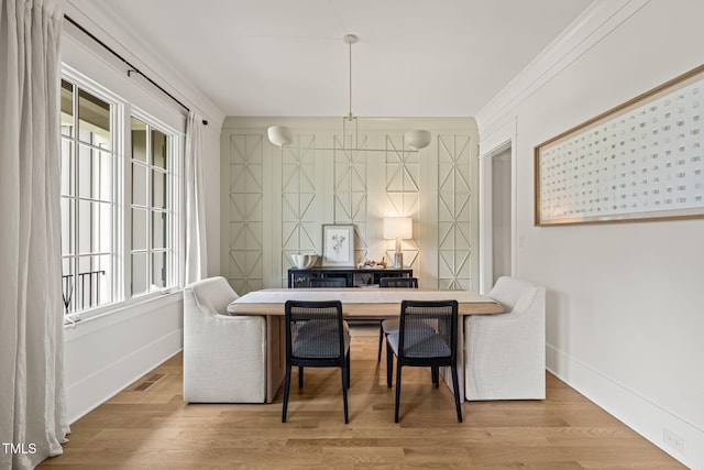 5308 Montclair Dr, Raleigh, NC 27609 - dining space with baseboards and wood finished floors