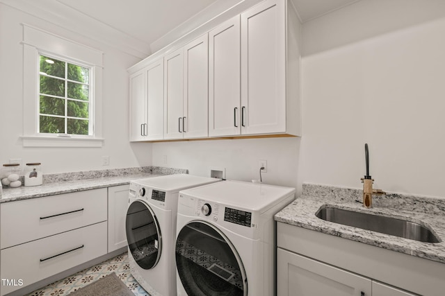 5308 Montclair Dr, Raleigh, NC 27609 - laundry area featuring cabinet space and independent washer and dryer