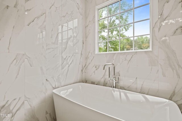 5308 Montclair Dr, Raleigh, NC 27609 - bathroom with tile walls and a freestanding bath