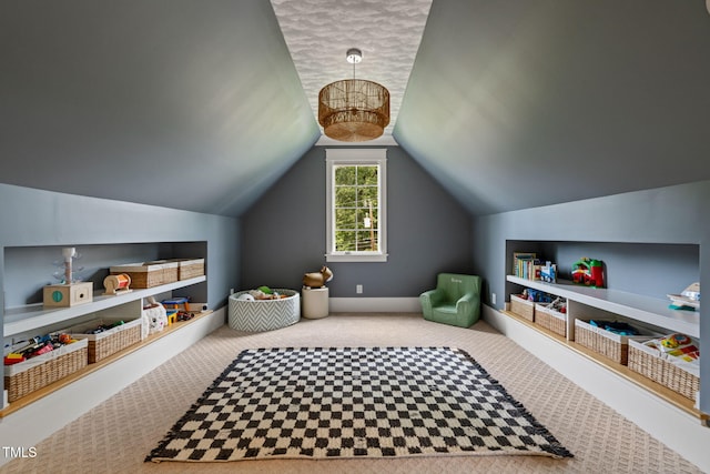 5308 Montclair Dr, Raleigh, NC 27609 - rec room with carpet flooring, vaulted ceiling, and built in features