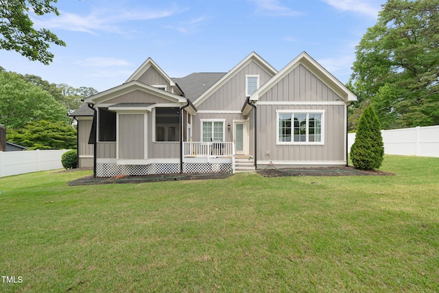 5308 Montclair Dr, Raleigh, NC 27609 - view of front facade featuring a sunroom and board and batten siding