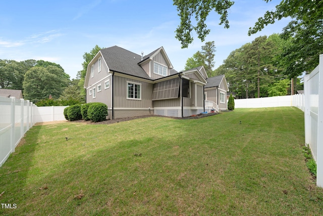 5308 Montclair Dr, Raleigh, NC 27609 - back of property with roof with shingles and board and batten siding
