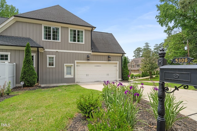 5308 Montclair Dr, Raleigh, NC 27609 - view of home's exterior with a shingled roof, concrete driveway, and a garage