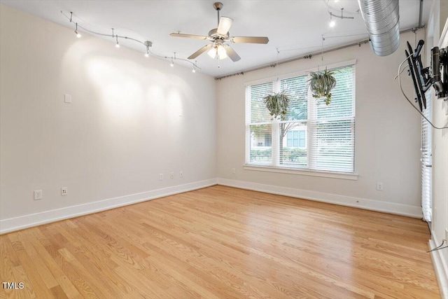 300 Finsbury St Unit 109, Durham, NC 27703 - unfurnished room with ceiling fan, light wood finished floors, and baseboards