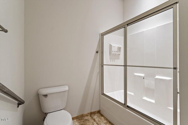 300 Finsbury St Unit 109, Durham, NC 27703 - full bath with combined bath / shower with glass door, baseboards, and toilet