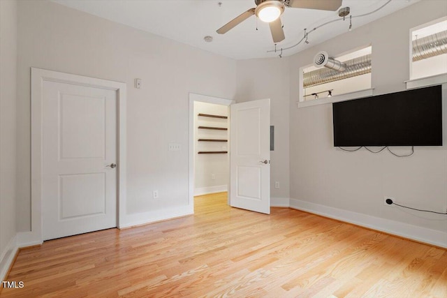300 Finsbury St Unit 109, Durham, NC 27703 - unfurnished bedroom with light wood-style flooring and baseboards