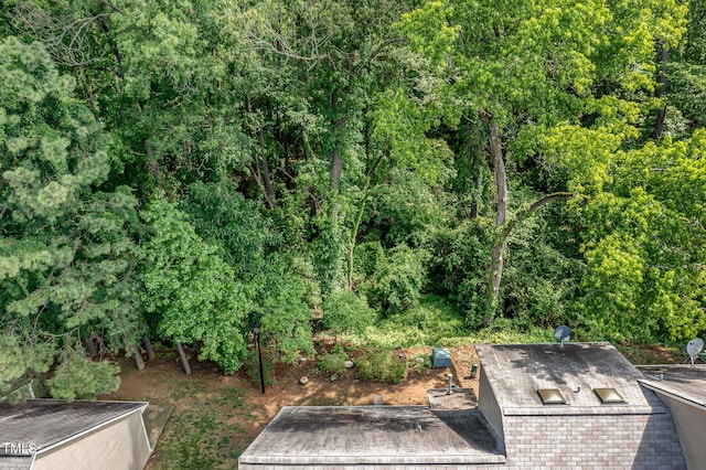 17 Crystal Oaks Ct, Durham, NC 27707 - view of yard with a wooden deck and a wooded view