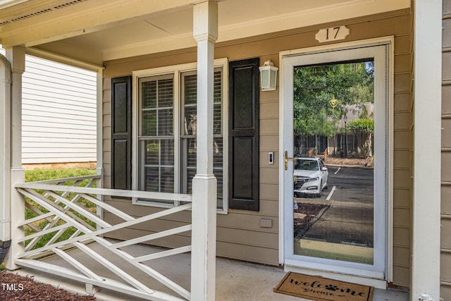 17 Crystal Oaks Ct, Durham, NC 27707 - view of exterior entry with a porch