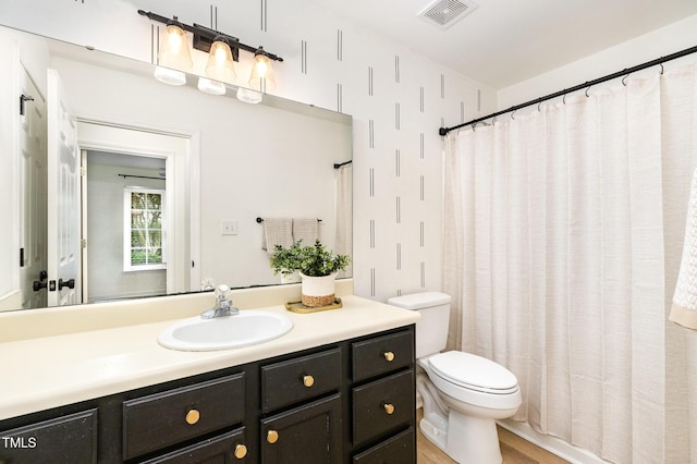 17 Crystal Oaks Ct, Durham, NC 27707 - bathroom featuring toilet, vanity, a shower with curtain, and wood finished floors