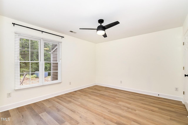17 Crystal Oaks Ct, Durham, NC 27707 - unfurnished room featuring light wood finished floors, ceiling fan, and baseboards