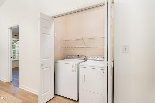 17 Crystal Oaks Ct, Durham, NC 27707 - laundry room with separate washer and dryer, light wood-style floors, and baseboards