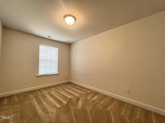 4716 Princess Lita Way, Raleigh, NC 27610 - spare room featuring baseboards and carpet floors