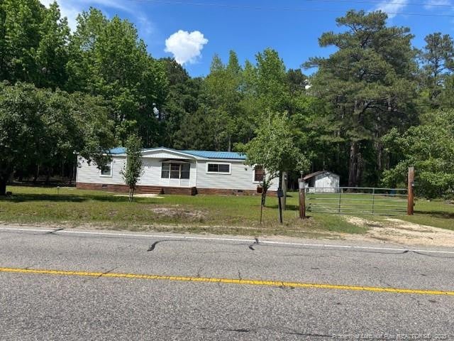 5689 NE Maxwell Rd NW, Stedman, NC 28391 - manufactured / mobile home with driveway and crawl space