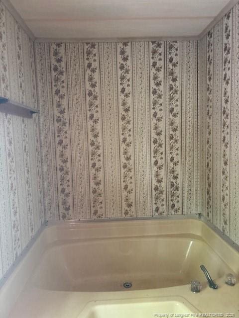 5689 NE Maxwell Rd NW, Stedman, NC 28391 - full bath with a bath and wallpapered walls