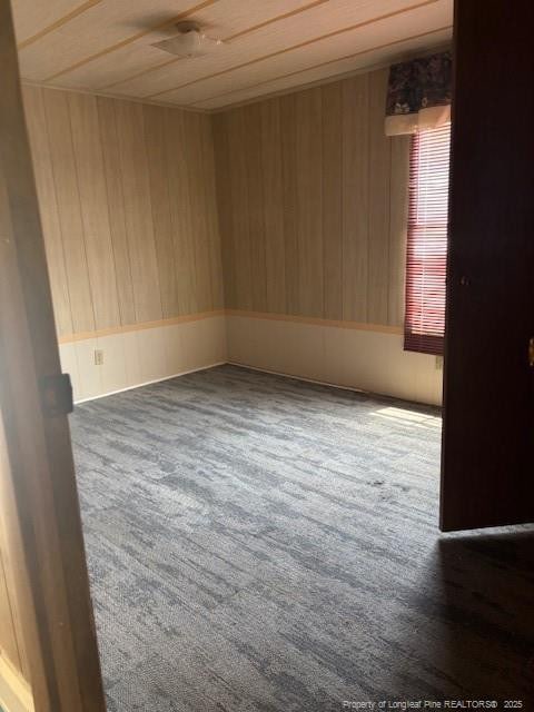 5689 NE Maxwell Rd NW, Stedman, NC 28391 - empty room with wood walls