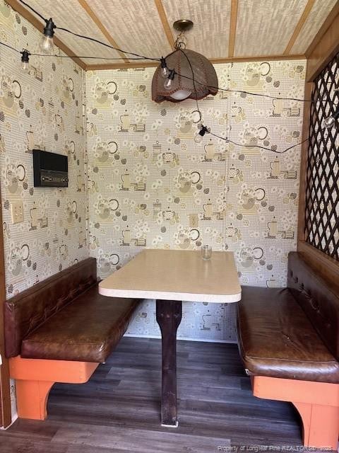 5689 NE Maxwell Rd NW, Stedman, NC 28391 - unfurnished dining area with wood finished floors, breakfast area, wallpapered walls, crown molding, and wood ceiling