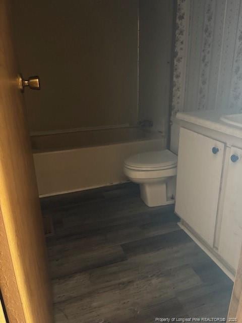 5689 NE Maxwell Rd NW, Stedman, NC 28391 - bathroom featuring vanity and wood finished floors