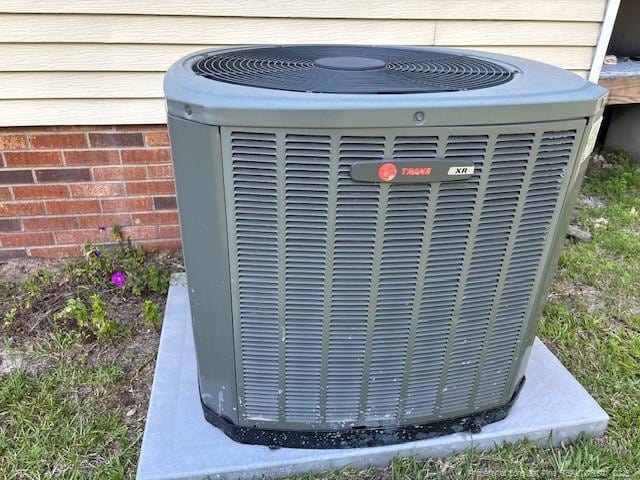 5689 NE Maxwell Rd NW, Stedman, NC 28391 - exterior view of a cooling unit and crawl space