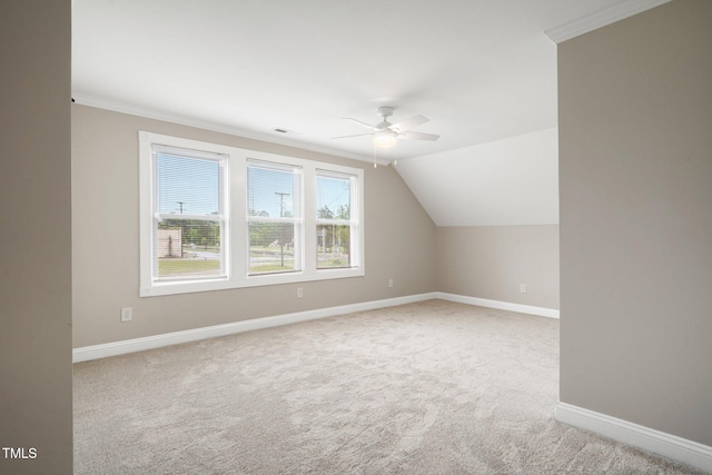 bonus room featuring a ceiling fan, carpet floors, baseboards, and vaulted ceiling