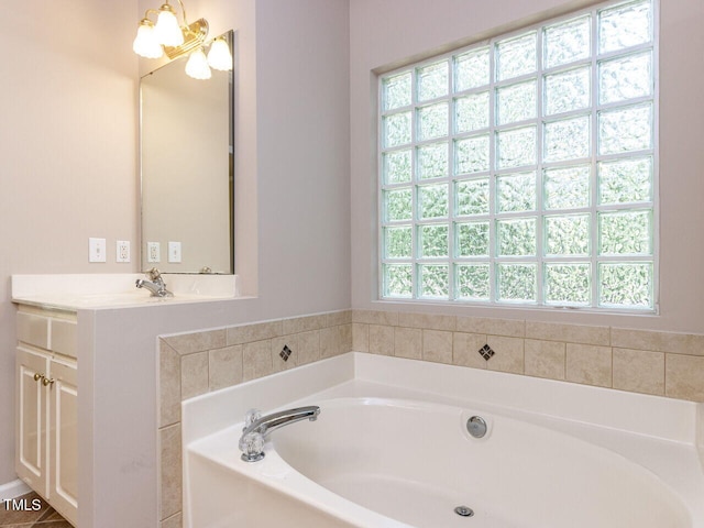 301 Monterey Ct, Benson, NC 27504 - full bath featuring a garden tub and vanity