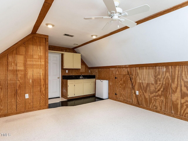 301 Monterey Ct, Benson, NC 27504 - additional living space featuring a sink, wooden walls, lofted ceiling, and ceiling fan