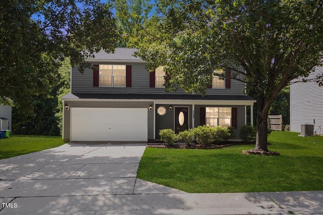 view of front of home featuring an attached garage, concrete driveway, a front yard, and central AC unit