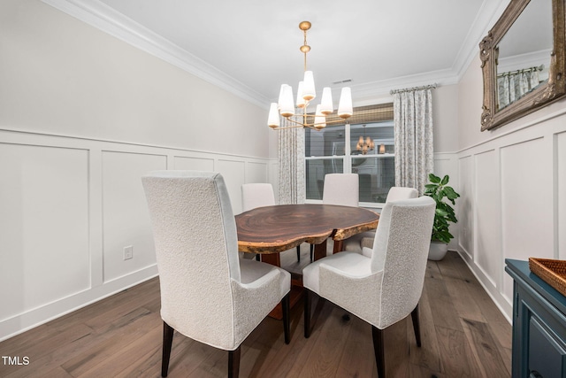 829 Churton Pl, Cary, NC 27518 - dining room featuring a decorative wall, a chandelier, crown molding, dark wood finished floors, and a wainscoted wall