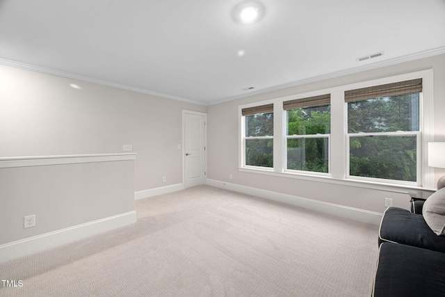 829 Churton Pl, Cary, NC 27518 - unfurnished living room with ornamental molding, baseboards, and light colored carpet
