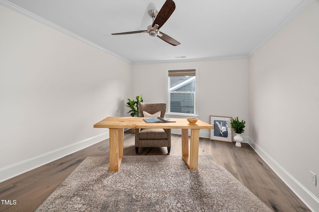 829 Churton Pl, Cary, NC 27518 - home office featuring a ceiling fan, baseboards, wood finished floors, and crown molding