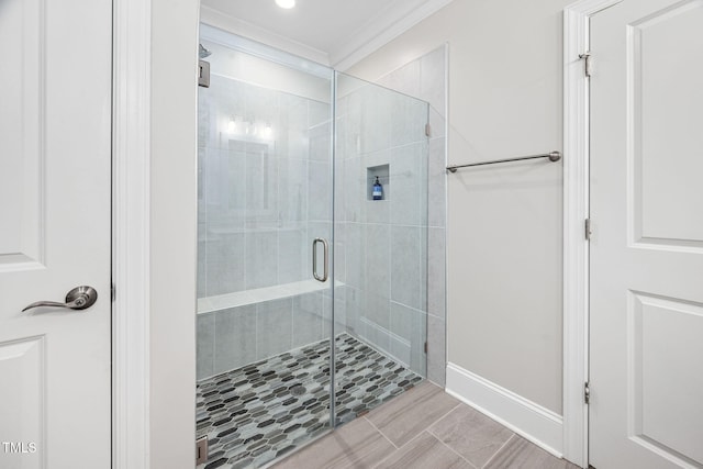 829 Churton Pl, Cary, NC 27518 - bathroom featuring ornamental molding, a shower stall, and baseboards