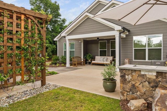 829 Churton Pl, Cary, NC 27518 - view of patio with an outdoor living space, ceiling fan, and central AC