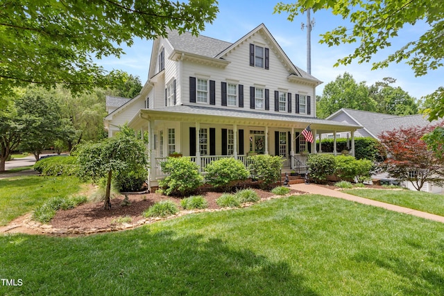 200 Cobblepoint Way, Holly Springs, NC 27540 - view of front of property featuring a porch, a front lawn, and roof with shingles