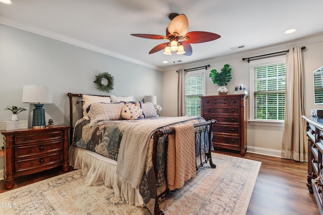 200 Cobblepoint Way, Holly Springs, NC 27540 - bedroom featuring wood finished floors, multiple windows, baseboards, ornamental molding, and recessed lighting