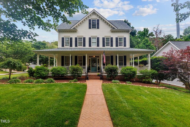 200 Cobblepoint Way, Holly Springs, NC 27540 - view of front of home featuring a porch, a front lawn, and a shingled roof