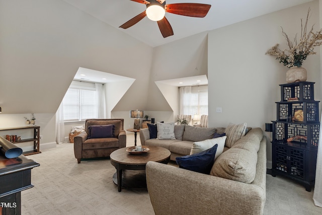 200 Cobblepoint Way, Holly Springs, NC 27540 - living area with a ceiling fan, healthy amount of natural light, light colored carpet, and vaulted ceiling