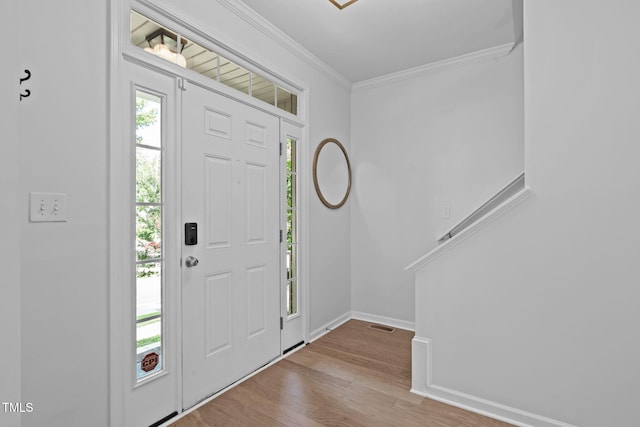 3204 Plaza Pl, Raleigh, NC 27612 - entrance foyer with wood finished floors and ornamental molding