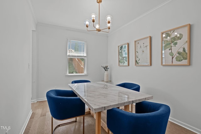 3204 Plaza Pl, Raleigh, NC 27612 - dining area with ornamental molding, a chandelier, and wood finished floors